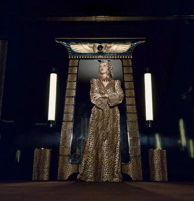 English model Twiggy models a leopardskin robe at Biba’s Kensington store, 1971
