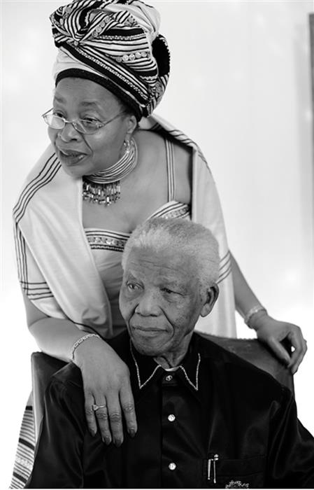 Nelson Mandela and his wife Graça Machel during his 90th birthday celebrations in Hyde Park on June 