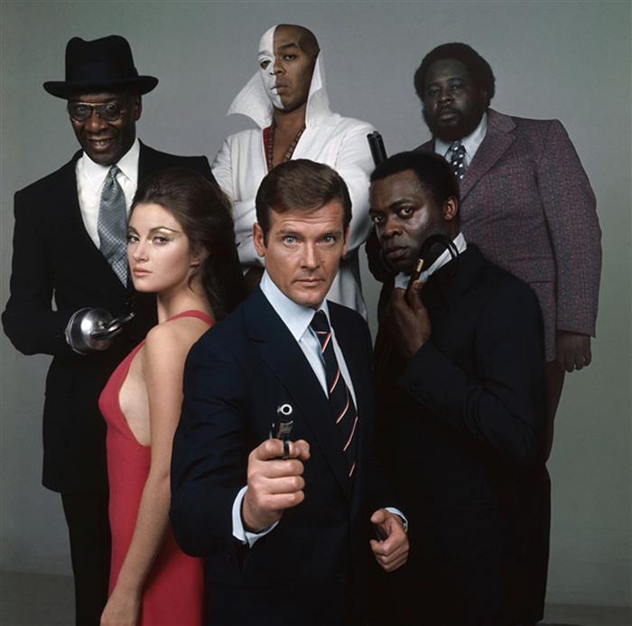 Roger Moore as James Bond with Cast 1973