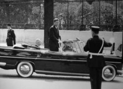 JFK Standing in car, 1961 