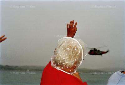 Woman waving to Helicopter