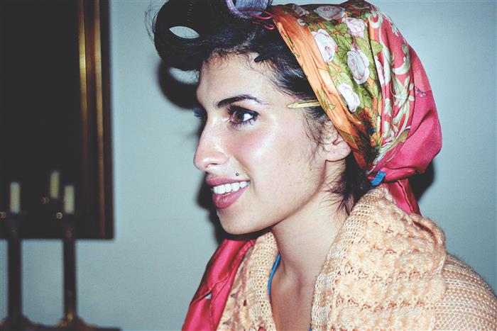 Amy Winehouse  with curlers