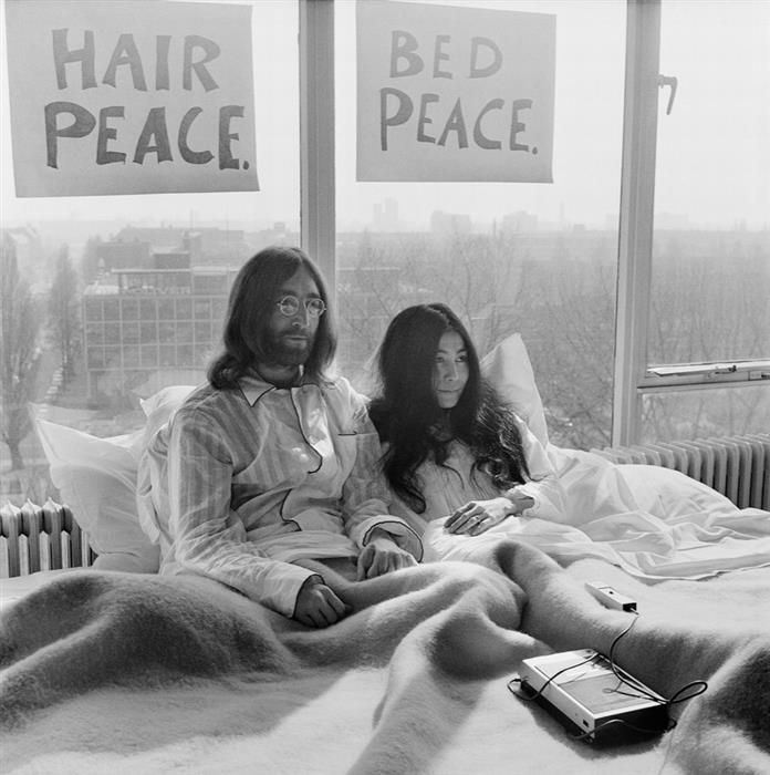 John Lennon and Yoko Ono.  The 'Bed-Ins for Peace'